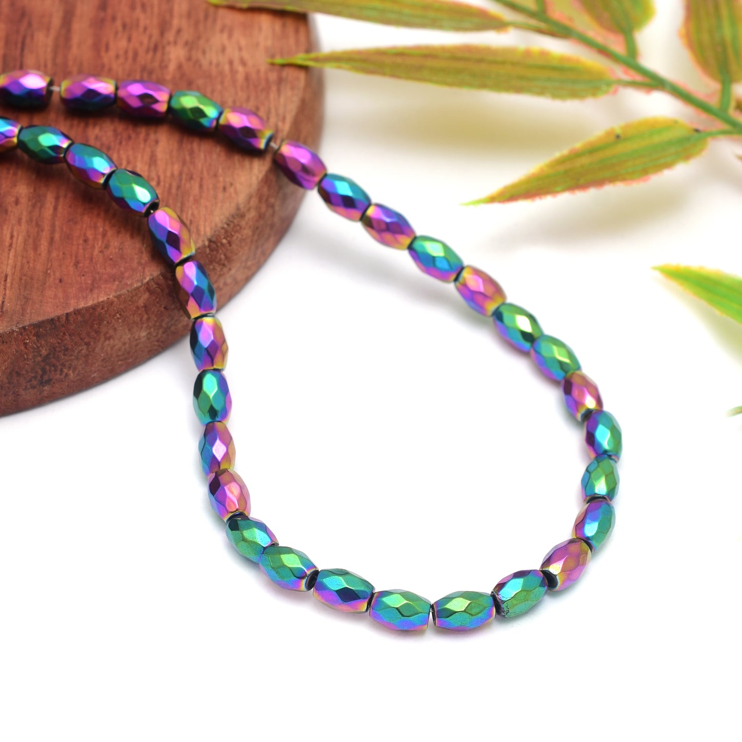 Kamal Gems | Rainbow Barrel-Shaped Hematite Beads Strand