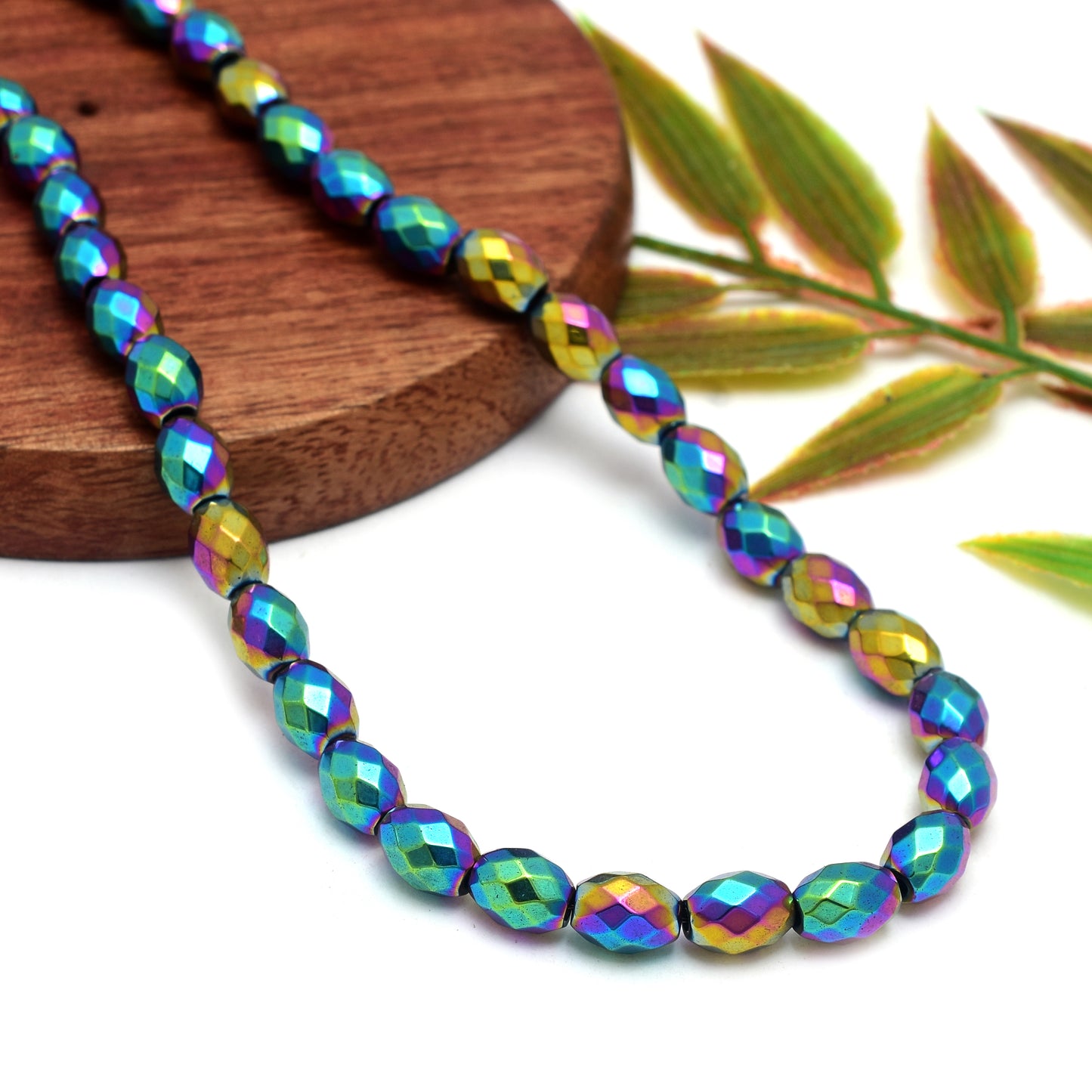 Kamal Gems | Multicolored Barrel-Shaped Hematite Beads Strand