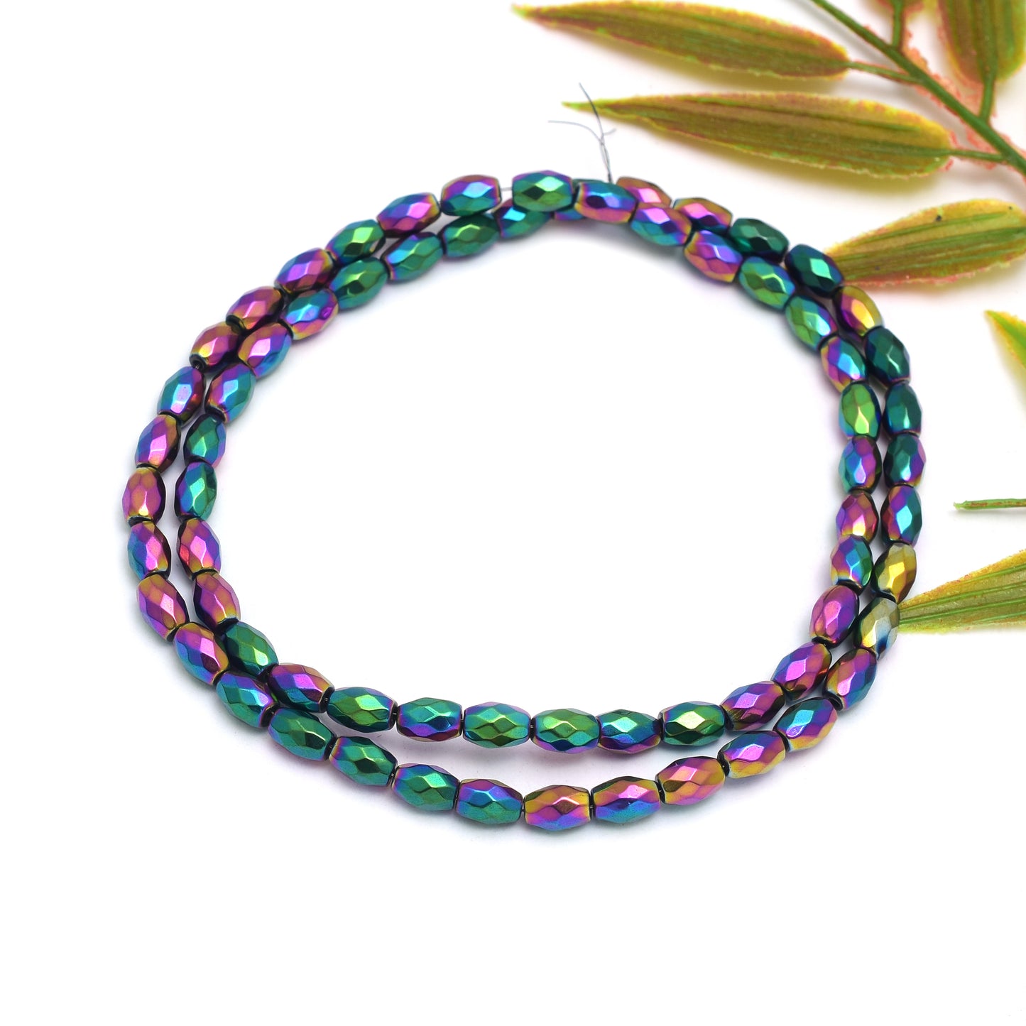 Kamal Gems | Rainbow Barrel-Shaped Hematite Beads Strand